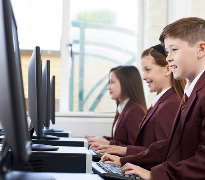 School children on computers in class 01